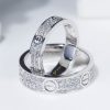 Nhẫn đôi kim cương Catier Love Ring vàng trắng