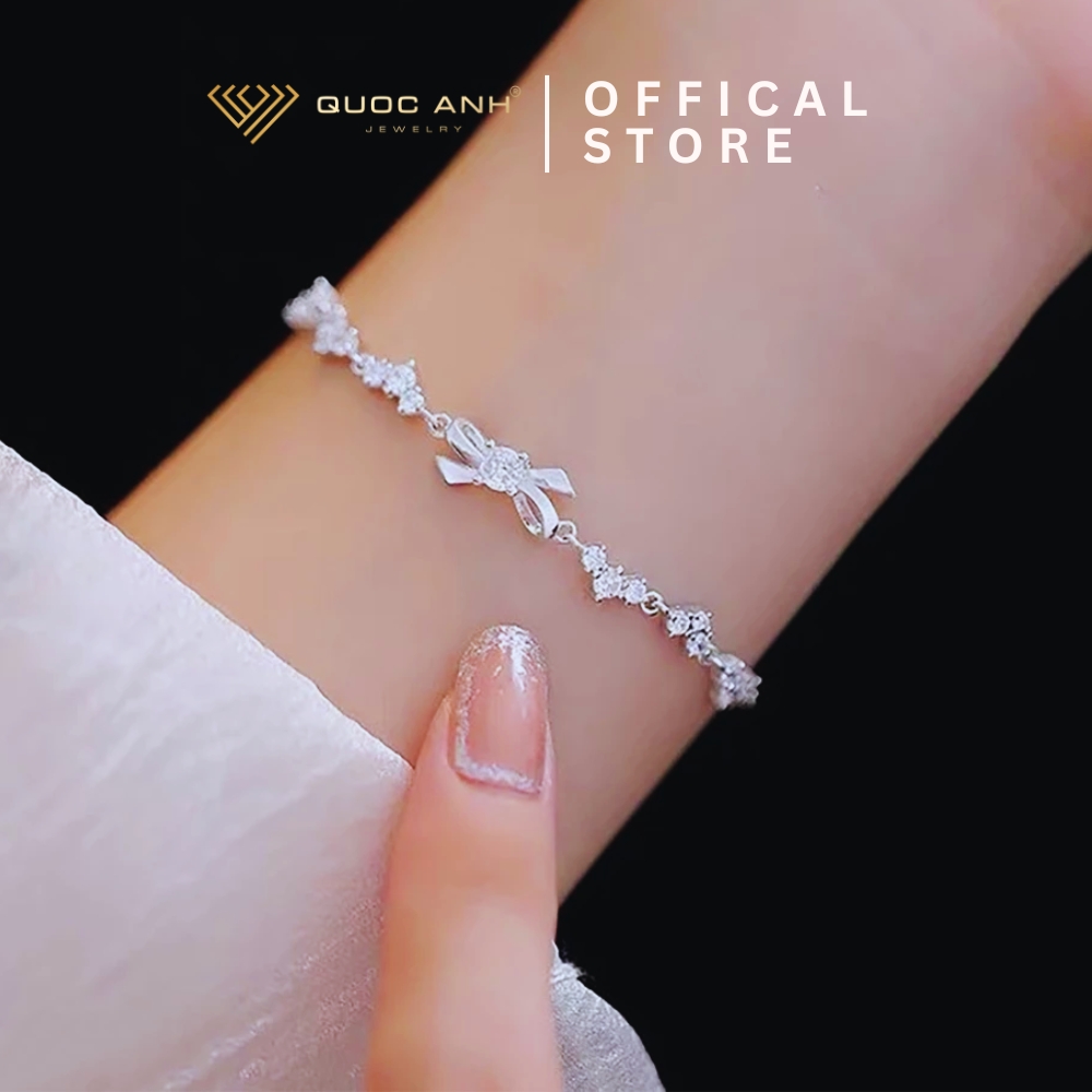 Lac-tay-bac-nu-that-no-mix-da-thanh-lich-QUOCANHJEWELRY-DIVAT0216 Lắc tay nữ bạc thắt nơ mix đá thanh lịch DIVAT0216