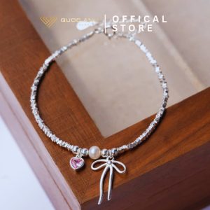 Lắc tay bạc nữ thắt nơ mix ngọc trai và trái tim hồng thanh lịch DIVAT0212
