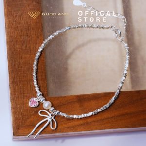 Lắc tay bạc nữ thắt nơ mix ngọc trai và trái tim hồng thanh lịch DIVAT0212
